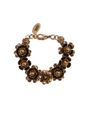 Bracciale di catena con tralcio di fiori in ottone dorato