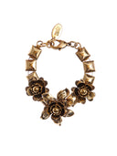 Bracciale di catena con tralcio di fiori in ottone dorato