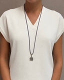 COLOURED CORD NECKLACE WITH CRYSTAL PENDANT