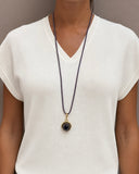 COLOURED CORD NECKLACE WITH CRYSTAL PENDANT
