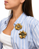 SPILLA FIORE CON PIETRA CENTRALE E CORNICE DI STRASS