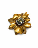 SPILLA FIORE CON PIETRA CENTRALE E CORNICE DI STRASS